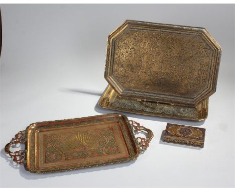 Indian brass trays, each profusely engraved with swirls, peacocks etc, together with an Indian cigarette box, (4)