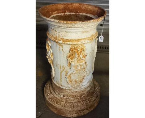 Cast iron cylindrical garden pedestal/planter with relief mask decoration on acanthus leaf base. 50 cm diameter approx. (B.P.