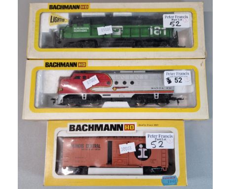 Three Bachmann HO electric trains to include: Steel Box Car Illinois Central, EMD GP30 Diesel Burlington Northern and EMD FT 