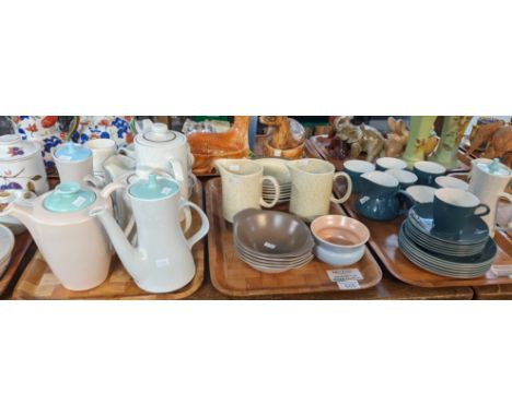 Collection of Poole Pottery items to include water jugs, teapots, mugs, cups, saucers, bowls, etc. Varying designs and colour