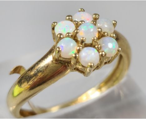 9ct gold and opal multi-cluster flowerhead ring. 2.6g approx. Size O1/2.  (B.P. 21% + VAT)