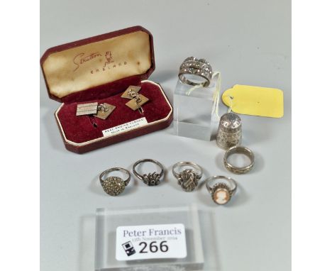 Collection of silver dress rings including: a cameo ring, marcasite and other dress rings, Art Deco style rings, silver thimb