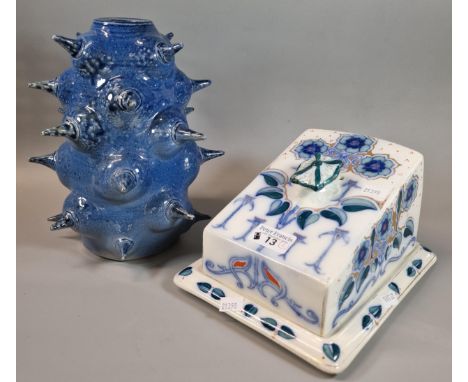 Burleigh Ware Tudor ceramic cheese dish and cover in Art Nouveau floral designs, together with a blue ceramic spiky vase, the