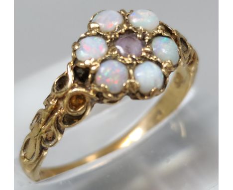 9ct gold opal flowerhead ring. 2.3g approx. Size O1/2.  (B.P. 21% + VAT)