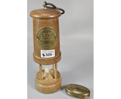 Edward VII brass miner's snuff box marked 'W. J. Hayden, Aberavon 1904', together with a reproduction wooden miner's lamp. (2