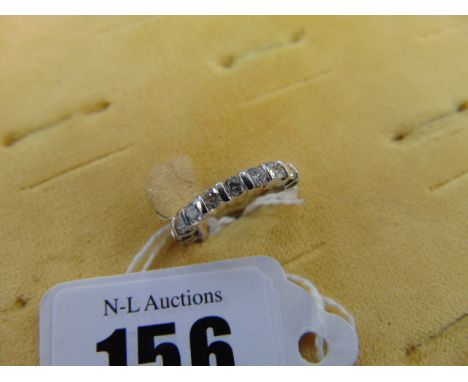 An 18ct White Gold Eternity ring, 18 Diamonds, total 1.5 carats, size L