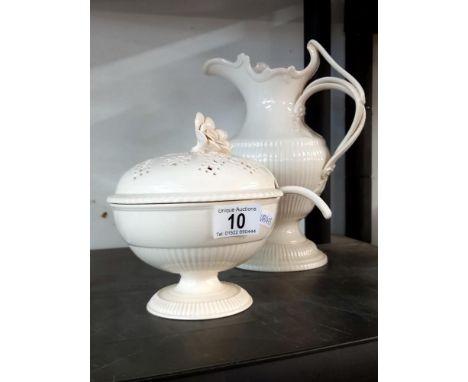 A creamware jug and lidded bowl with ladle