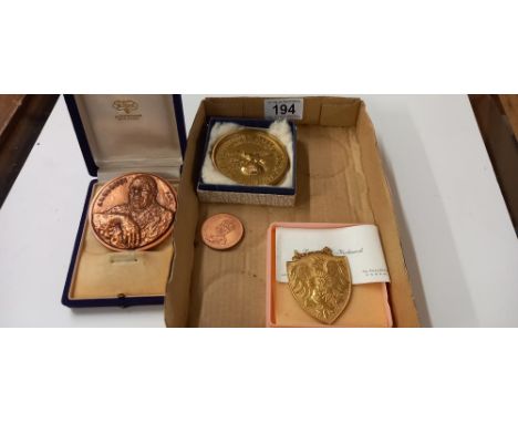 First national bank of Boston brass paperweight JL Borges medallion etc