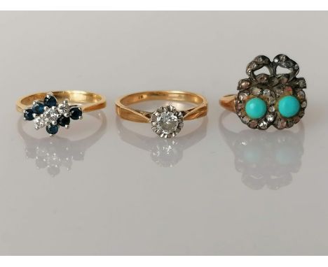 A diamond and sapphire cluster ring; a diamond solitaire and a platform ring with turquoise and diamond decoration, some diam