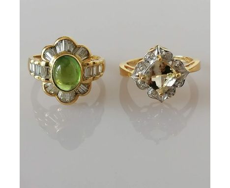 A peridot and diamond cocktail ring on an 18ct gold setting, the cabochon peridot, 8 x 7mm, surrounded by 12 baguette-cut dia