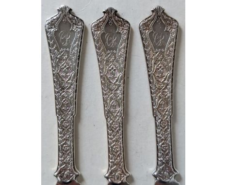 A set of eleven Art Nouveau Tiffany &amp; Co. silver 'Persian' pattern knives, designed by Edward C. Moore, monogrammed, each