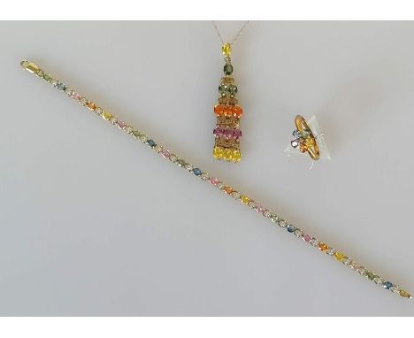 A multi-gem or 'Tutti Frutti' line or tennis bracelet on a gold setting, 18 cm with matching ring, size O and pendant chain, 