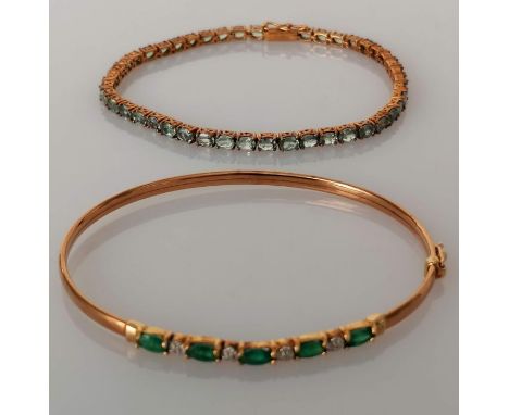 A tourmaline line or tennis bracelet on a 9ct gold claw setting, each stone 3 x 2mm, box clasp, 18.5 cm and an emerald and di