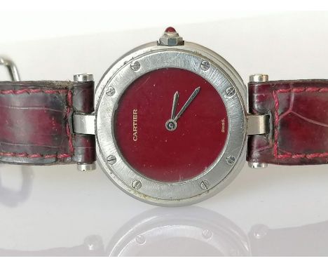 A Santos de Cartier quartz wristwatch with stainless steel case, ox blood face, dial 22mm without crown, signed to face and b