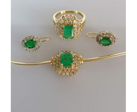 An emerald and diamond parure comprising a gold snake-link necklace, 42 cm, with pendant, head 15 x 15mm, emerald 8 x 6mm (di