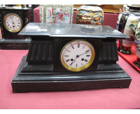 A Black Slate Mantel Clock, of Architectural form, fluted decoration on a plinth base, white enamel dial, makers mark rubbed,