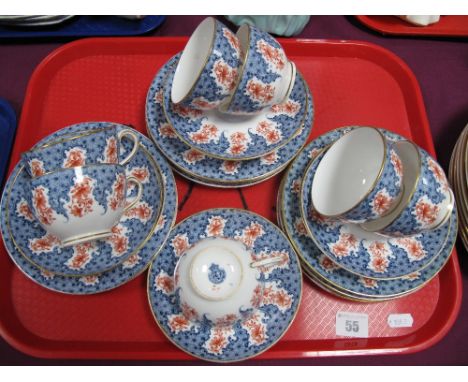 A Royal Worcester Tea Service, with gilt highlights, floral decoration (with blue transfer mark on base W5234) twenty three p