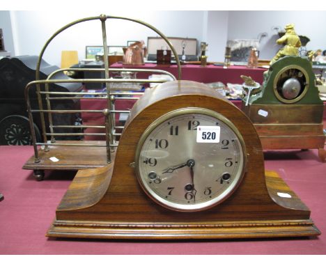 A 1920's Walnut Cased Musical Mantel Clock; together with an early XX Century gilded brass two sectional magazine rack.
