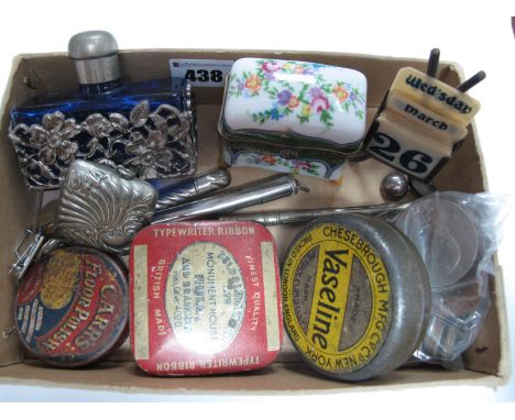 An EPNS Vesta Case, golf themed perpetual calendar, enamel badges, world coins, vintage advertising tins, etc:- One Tray