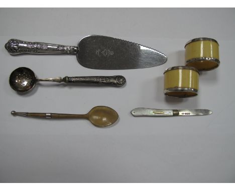 A Hallmarked Silver Handled Cake Slice, together with a hallmarked silver handled sifter spoon, a horn spoon, a hallmarked si