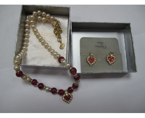 Christian Dior; A Vintage Imitation Pearl Bead Necklace, with pink bead highlights and heart drop, clasp stamped "Chr Dior", 