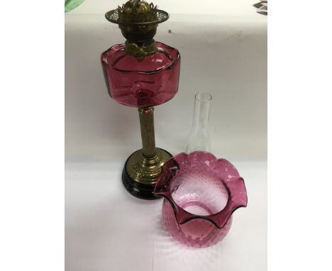 Victorian Cranberry glass oil lamp with cranberry glass reservoir and shade including a pine transporting box