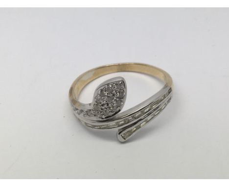A gold ring, possibly 9ct, set with small diamonds, approx 2.8g and approx size R-S.