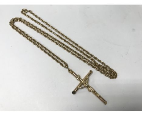 A 9ct gold cross pendant with 9ct gold chain. Weight approx 9.6g