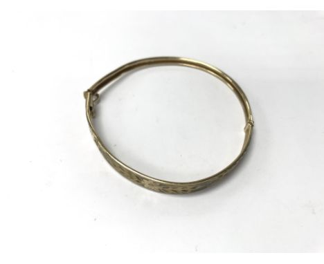 A 9ct gold bangle. Weight approx 5.5g