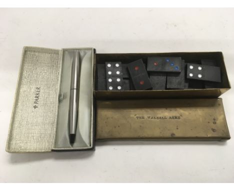 A boxed Parker pen and a brass dominos box and contents, the box marked 'The Walsall Arms' (2).