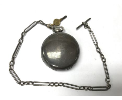 A silver pair case pocket watch on chain.