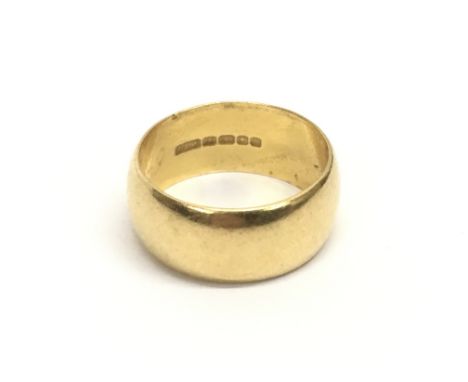 A 22ct gold wedding band, ring size S/R