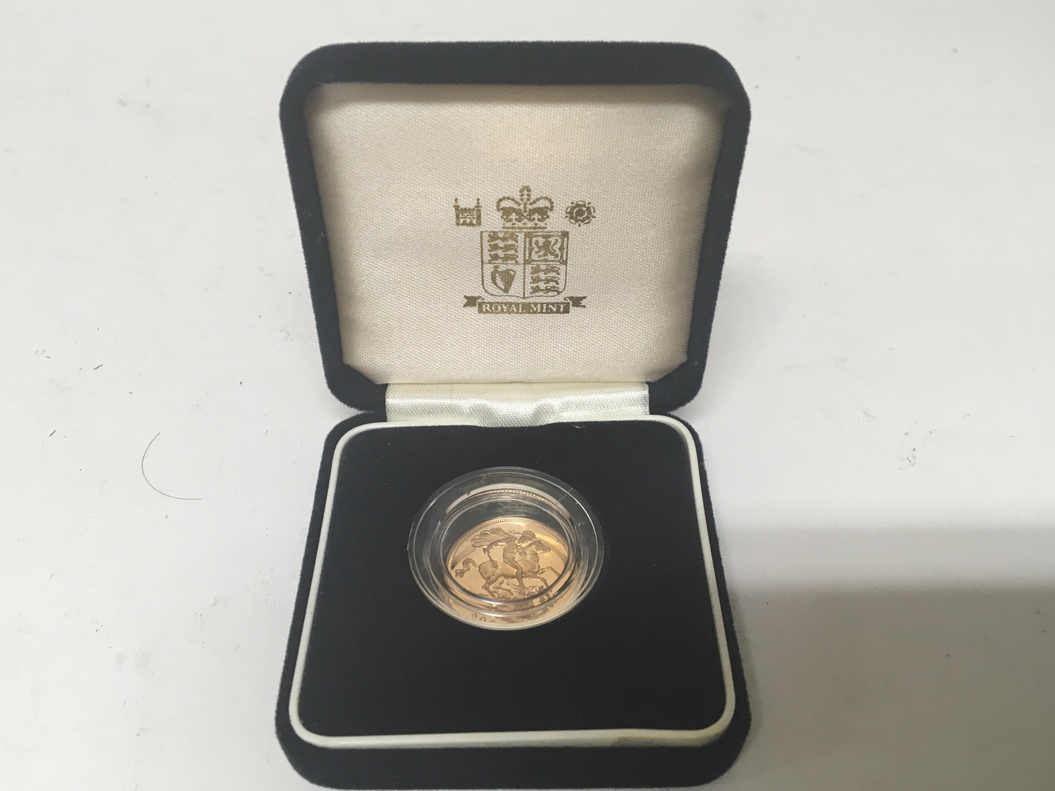 A 2001 full Sovereign in a Royal Mint Box