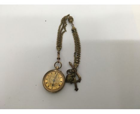 A 9ct gold watch with attached chain