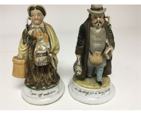 A Pair of Continental late 19th Century ceramic match holders in the form of full length figures each with an inscription. I 