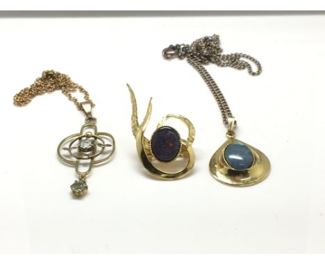 A 9ct gold Edwardian pendant necklace set with blue stones and an opal type brooch and necklace