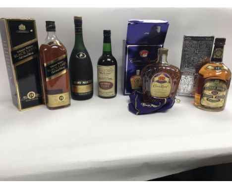 A collection of alcohol to ide a oed black label Johnnie Walker, a bottle of Remy Martin cognac, old tawny port and crown roy