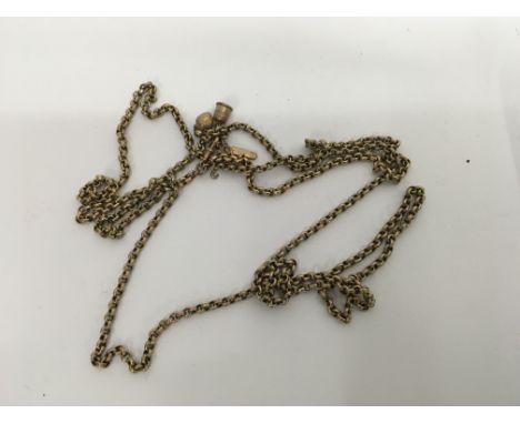 A 9 ct gold chain with attached charms 31 grams approx