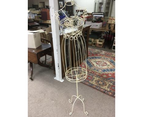 A wire mannequin, approx height 158cm.