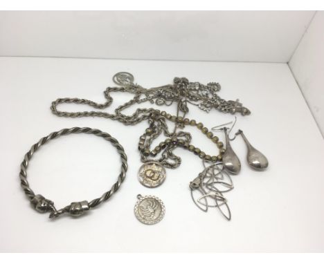 A small group of small silver jewellery including a bangle