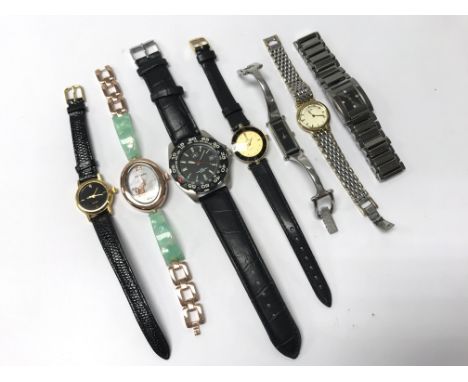 A bag of watches including Gucci &amp; Rotary.