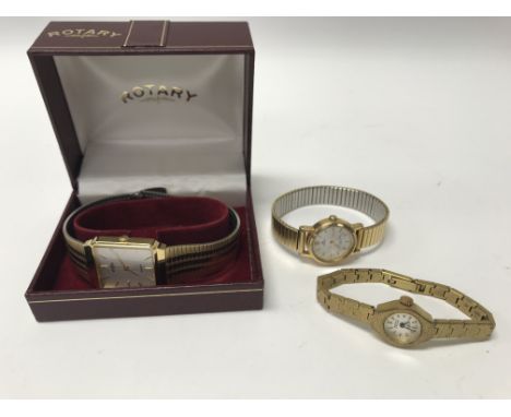 A boxed Rotary watch together with 2 ladies wristwatches.