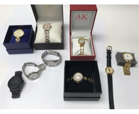 A collection of 9 (some boxed) modern design quartz watches including Rotary &amp; Anne Klein.