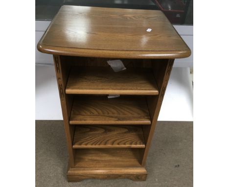 An Ercol open shelf storage CD unit bookcase.Approx 44x37x77cm