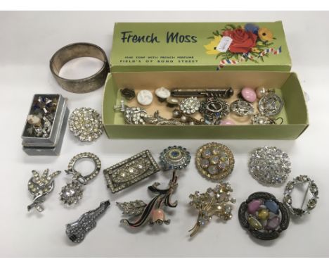 A collection of good quality costume jewellery inlcuding a silver bangle, various brooches set with marcasite etc.