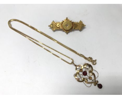 A 15ct gold brooch together with a 9ct gold pendant and chain. Total weight approx 9.5g