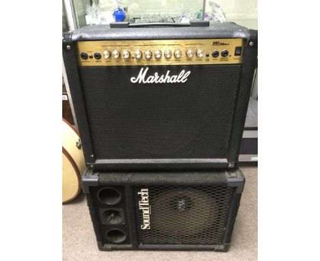 A Marshall MG30 DFX guitar amplifier and a Soundtech amplifier (2).