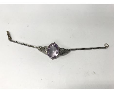 A silver and gold Art Deco amethyst bracelet.