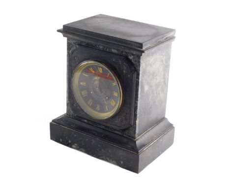 A Victorian black slate and marble mantel clock, with 11cm diameter Roman numeric dial, and eight day movement, in shaped cas