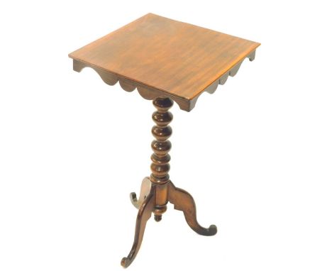 A 19thC mahogany occasional table, the square top with a shaped frieze, on a bobbin turned column and tripod base, 74cm high,